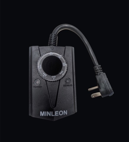 Light-sensing outdoor timer for holiday displays